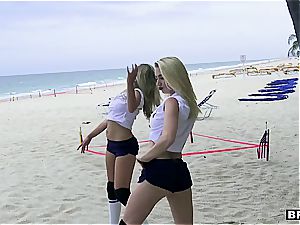 three teenager sweeties catch a humungous dong on the beach